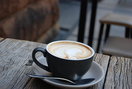 black cafe latte on cup thumbnail