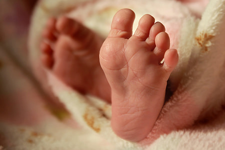 close photo of baby's feet thumbnail