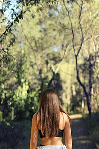 woman wearing black sports bra thumbnail