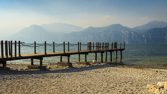 brown wooden dock on shore thumbnail