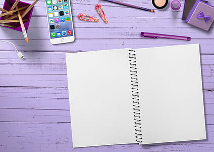 opened white notebook thumbnail