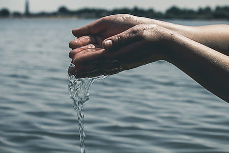 falling water from person's hands thumbnail