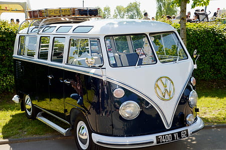 black and while Volkswagen van parked on road thumbnail