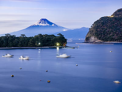 boat on body of water during daytime thumbnail