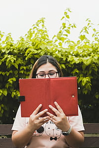 woman holding red case thumbnail