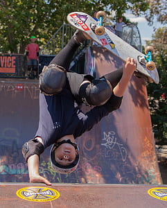 man doing tricks while riding on skateboard thumbnail