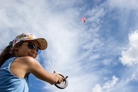 girl flying kite thumbnail