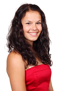 smiling woman wearing red tube top thumbnail