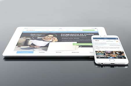 silver iPhone 6 on white iPad thumbnail