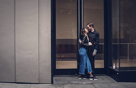 couple hugging in front of store facade thumbnail