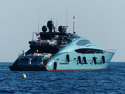blue ship on body of water thumbnail