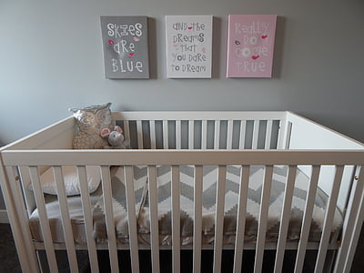 baby's white wooden crib thumbnail