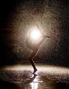 woman dancing against the light thumbnail