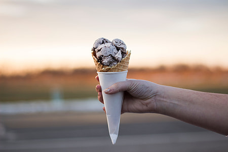 person holding ice cream thumbnail