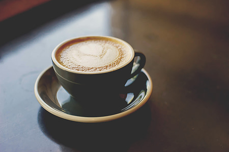 black ceramic cup with saucer thumbnail