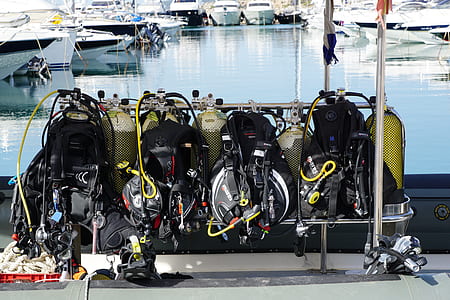scuba suits on gang chair thumbnail