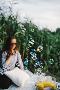 Having fun with soap bubbles in the nature thumbnail