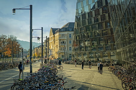 people walking near buildings during daytime thumbnail