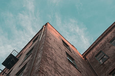 worm's eye view of brown concrete building thumbnail