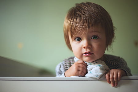 toddler wearing gray coat thumbnail