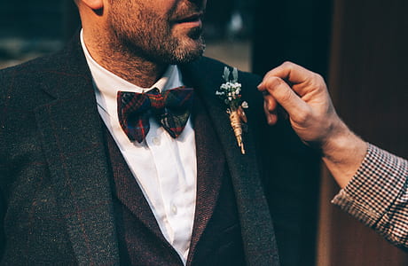 man wearing black suit jacket thumbnail
