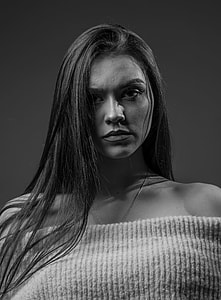 gray scale of woman wearing off shoulder top thumbnail