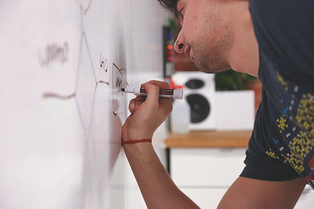man holding marker thumbnail