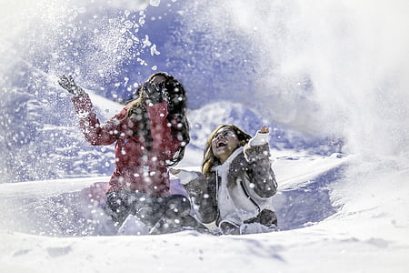 woman wearing gray and white snow coat thumbnail
