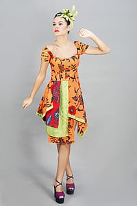 woman in brown dress thumbnail