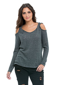 woman in gray cold-shoulder long-sleeved shirt and black jeans thumbnail