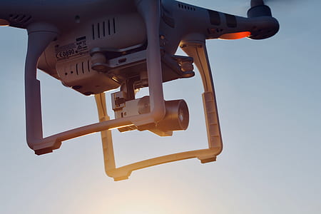 gray quadcopter drone photo at daytime thumbnail