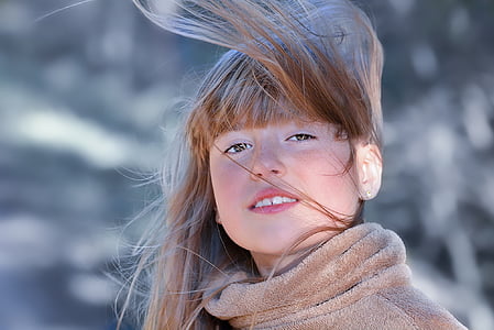 girl in brown coat thumbnail