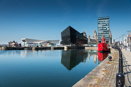 body of water under blue sky during daytime thumbnail