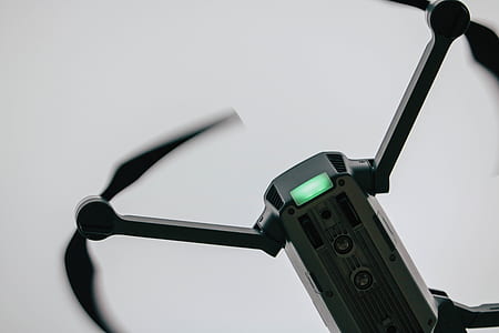 black quadcopter on closeup photography thumbnail
