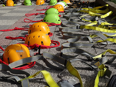 yellow and green hard hats on ground thumbnail