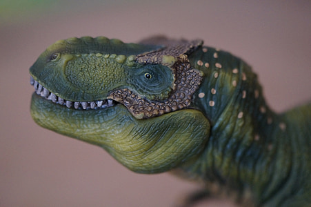 green T-rex figurine thumbnail