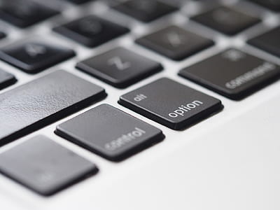 macro shot photography of black and gray keyboard keys thumbnail