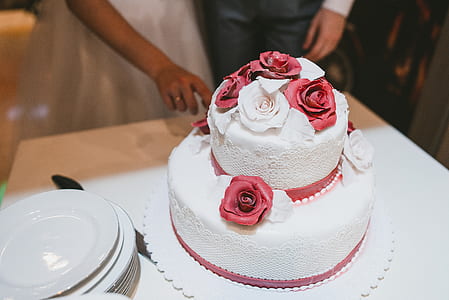 closeup photo of 2-tier cake with flower accent thumbnail