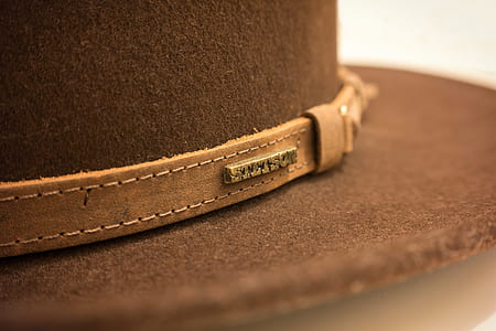 closeup photo of brown cap thumbnail