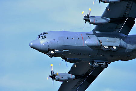 low angle photography of blue airplane thumbnail
