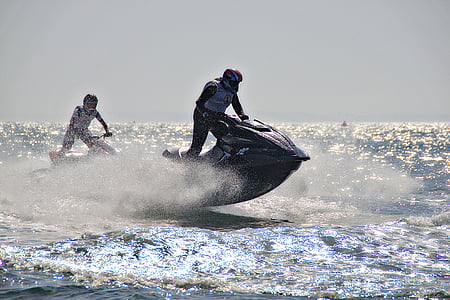 man riding on personal watercraft thumbnail