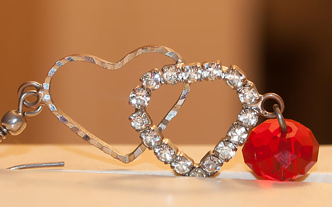 silver-colored heart pendant with clear gemstones thumbnail