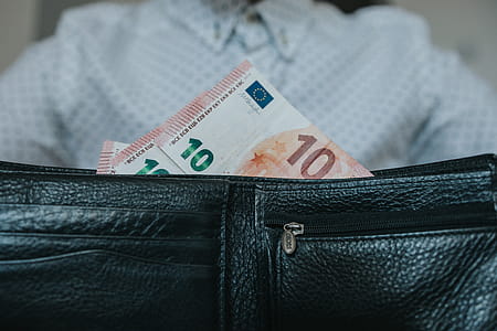 Banknotes in Black Leather Wallet Closeup Phoot thumbnail