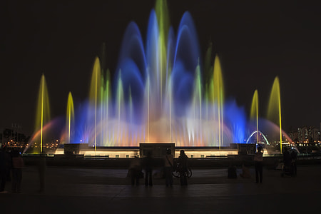 multi-colored fountain at night thumbnail