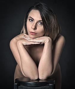 woman leaning on side table thumbnail