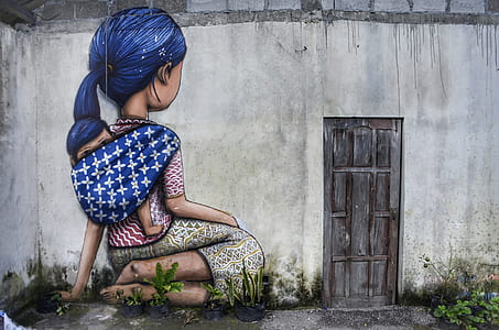 woman kneeling wall painting thumbnail