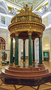 brown and gray concrete gazebo inside building thumbnail