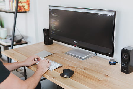 person holding Apple Magic keyboard thumbnail