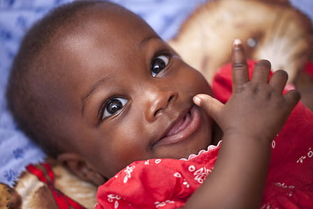 baby in red dress thumbnail