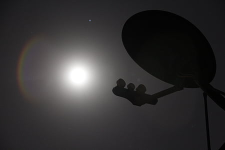 silhouette photo of satellite dish under full moon thumbnail